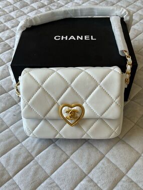 CHANEL White Quilted Lambskin Crossbody with Gold Heart CC